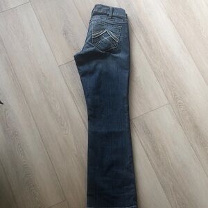 Ariat women’s Boot Cut Jeans in washed blue.